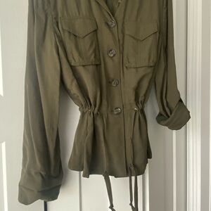 White House Black Market soft, fashion jacket. Olive in color. Size 4